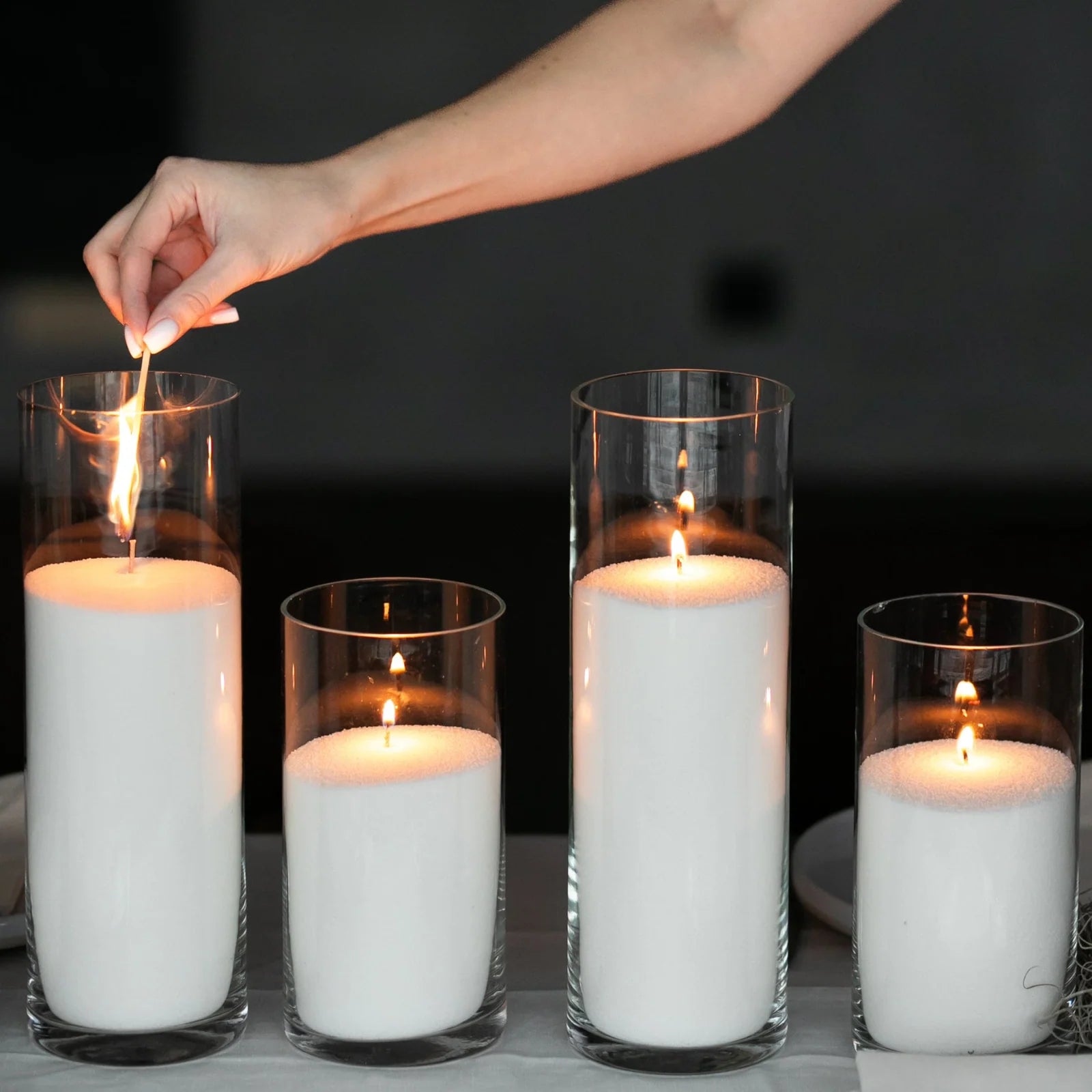 Levende lys i klare glas